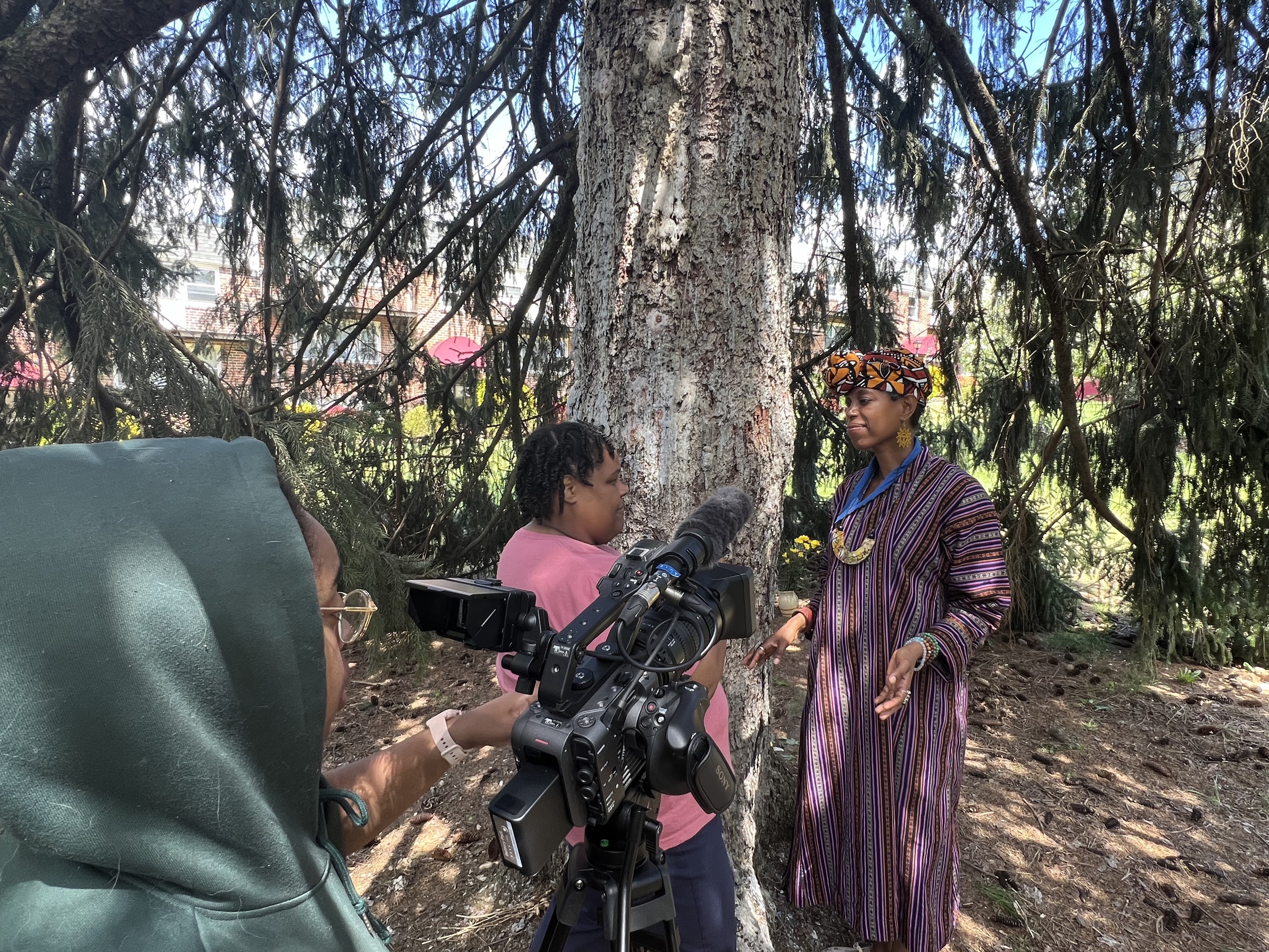 a woman being filmed on camera for a movie