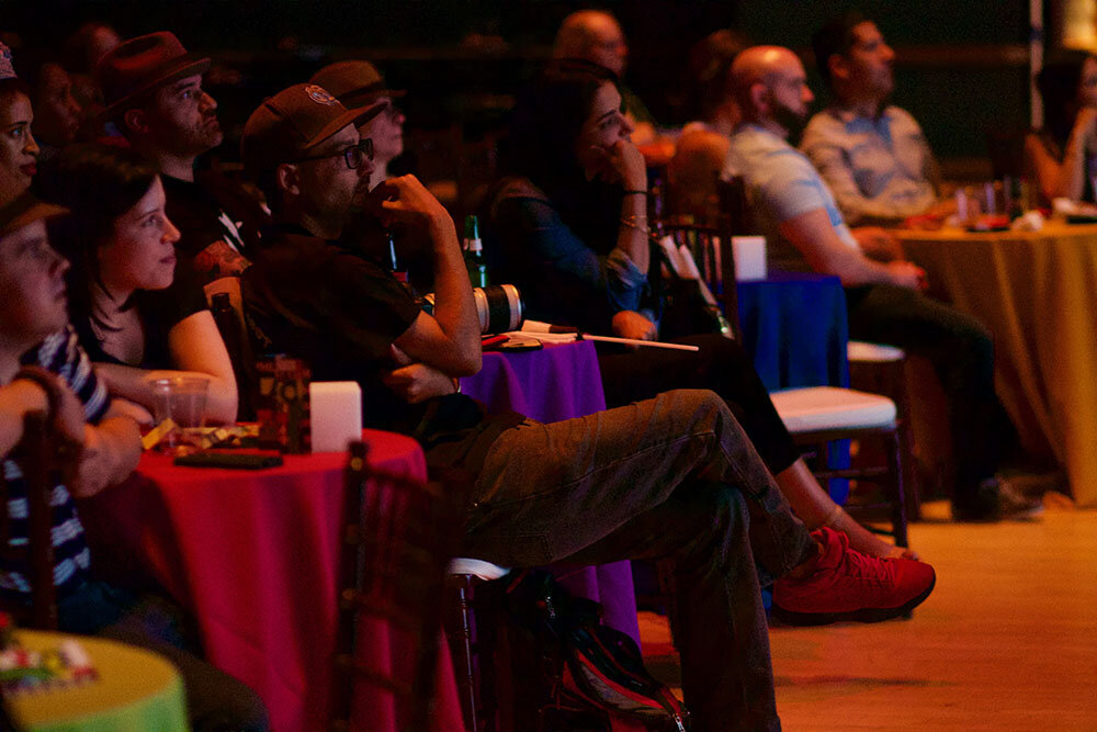 An audience gazing at a stage